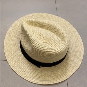 White and black straw hat. Panama style